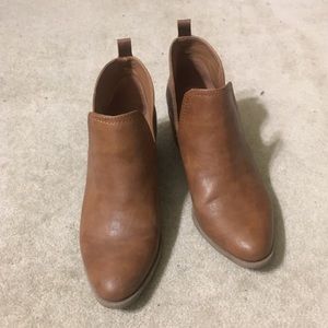 Brown leather boots with slits on the side